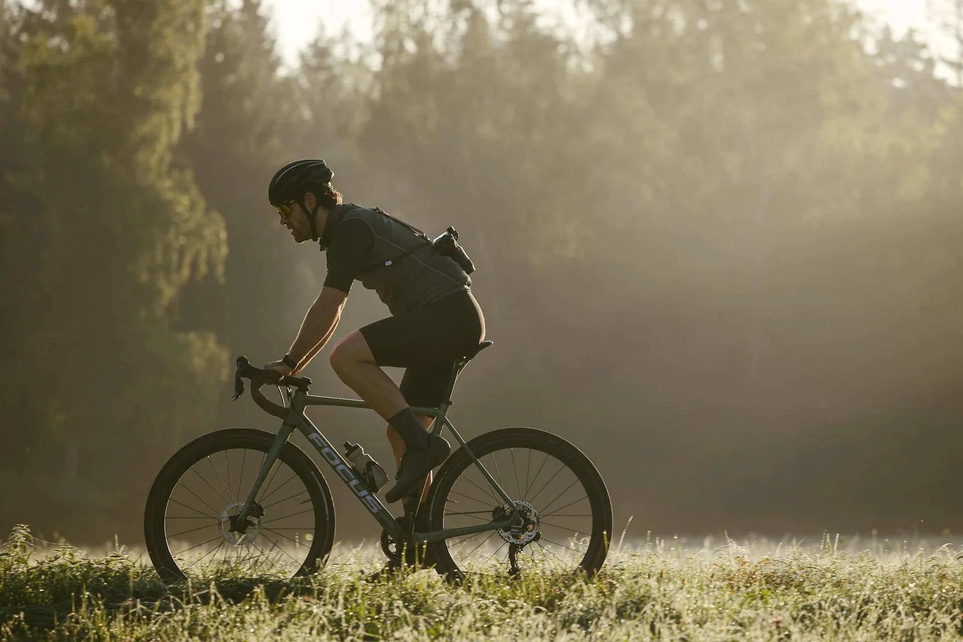 An adult cyclist riding outdoors on a recreational ride.
