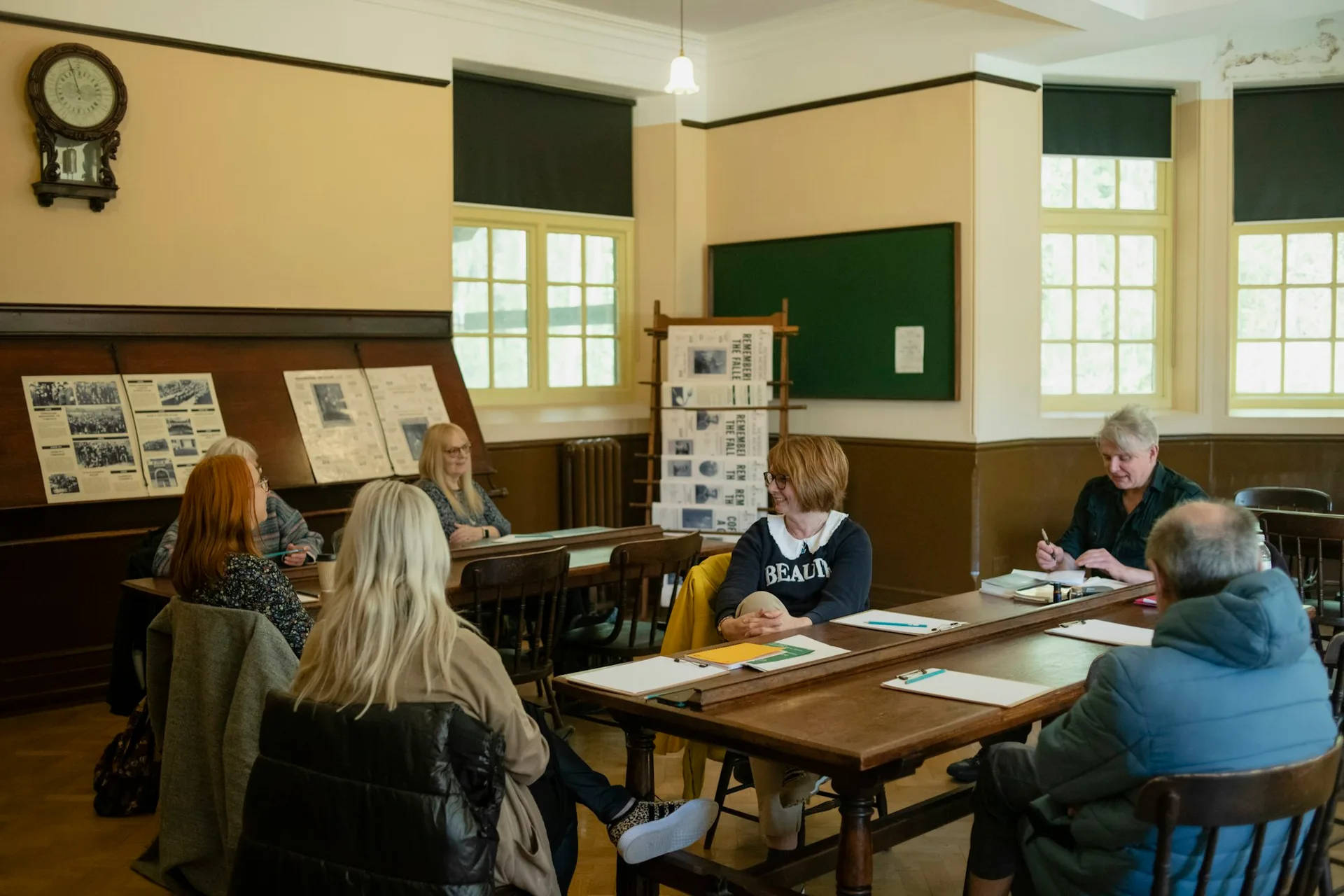 A small group of adults in a classroom-style health education session.